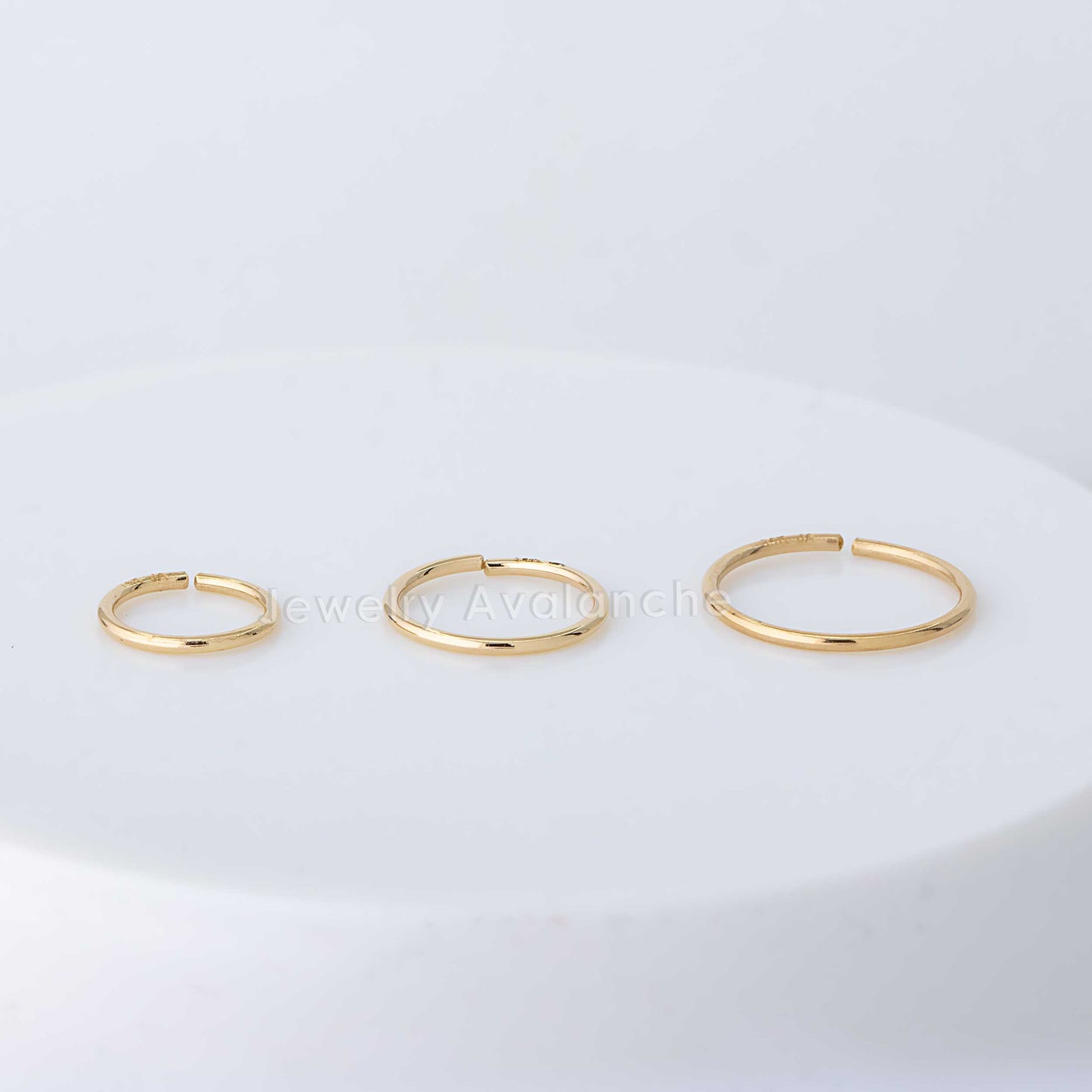 Jewelry Avalanche 20G 14K Yellow Gold Seamless Nose Hoop Ring, Twist-open Ring