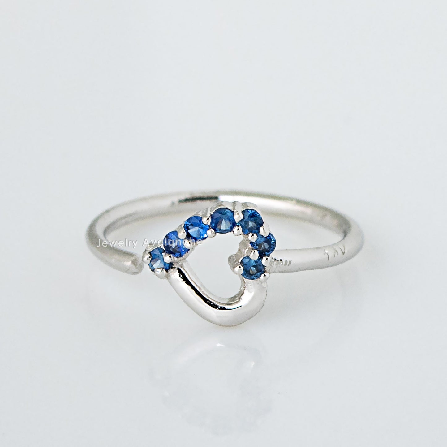 Jewelry Avalanche 20G 14K Gold Half-Heart Nose Hoop with Blue Sapphire Gemstones 8mm