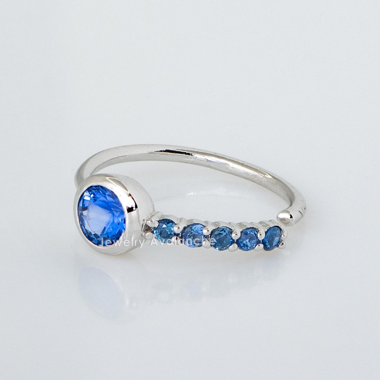 Jewelry Avalanche 20G 14K Gold Bezel Blue Sapphire Nose Hoop Ring, 5/16"(8mm)
