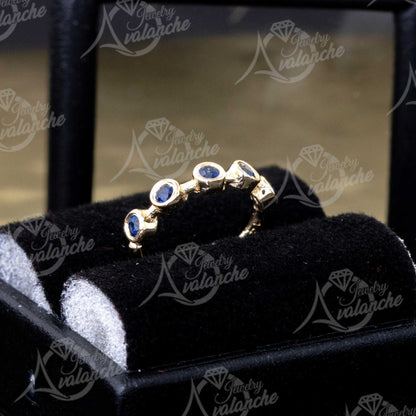 Jewelry Avalanche 14K Gold 5-stone Bezel set Blue Sapphire Nose Hoop, 8mm, 20G Nose Ring